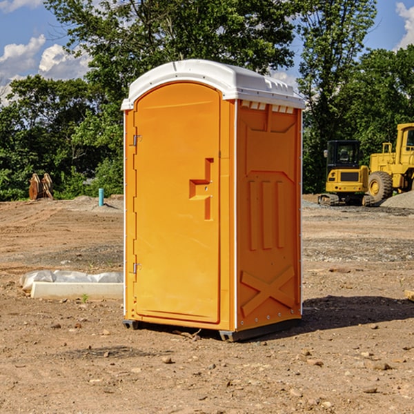 how often are the portable restrooms cleaned and serviced during a rental period in East Baldwin